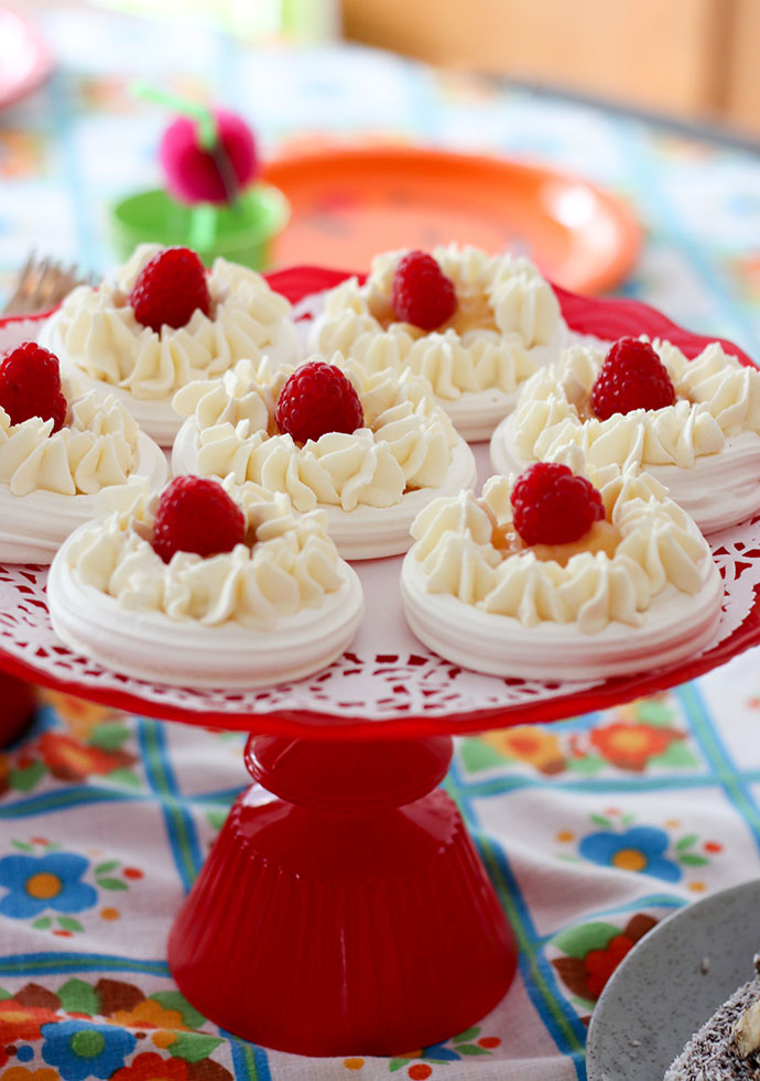 Mini raspberry and lemon curd meringues