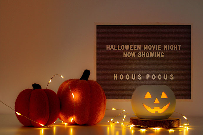 family Halloween movies night sign