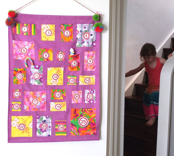 Advent morning child rushing down stairs for advent calendar treats