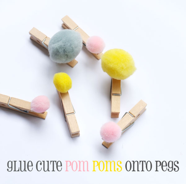 pom pom on pegs yellow