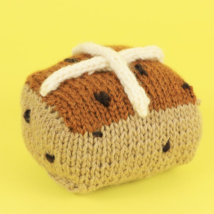 Knitted hot cross bun pattern