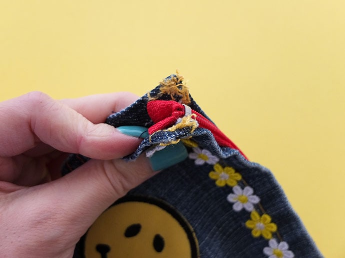 How to sew a zippered poch from old jean pockets