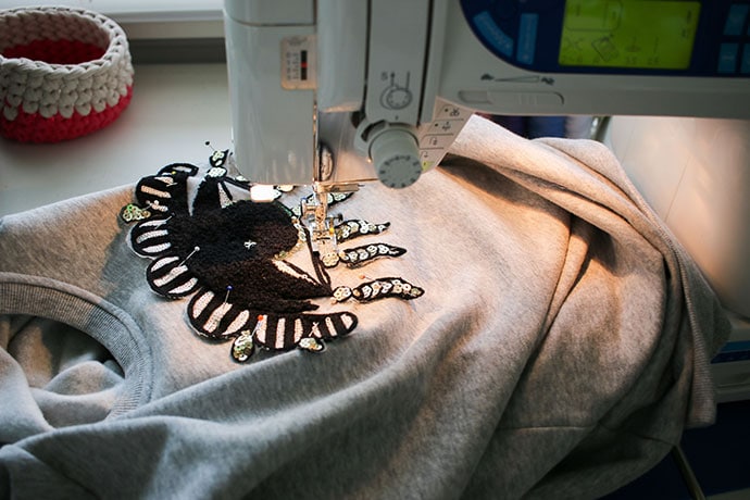 How to sew on a sewing applique onto a sweater