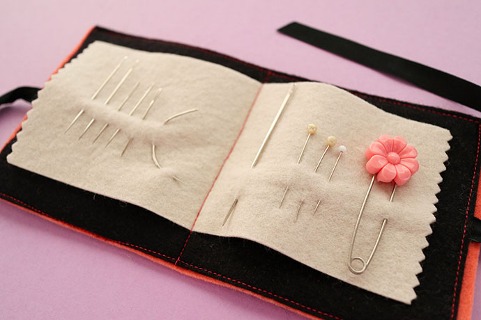 Felt needle book holding pins and needles