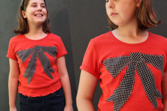 t shirt refashion - girl wearing orange tshirt with large bow applique