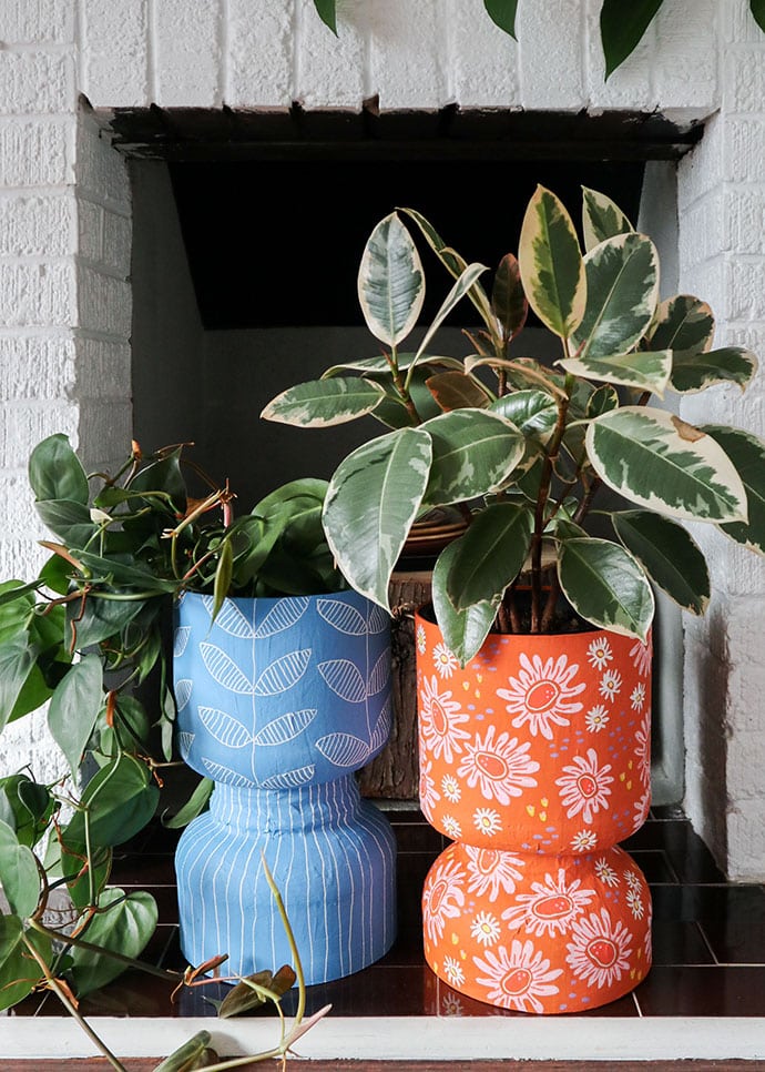 Two Decorative Planters made from recycled protein powder tub