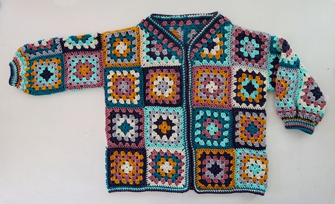 granny square cardigan on white background