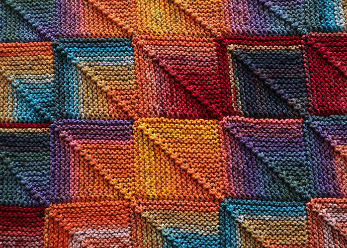 detail of mitered block blanket squares