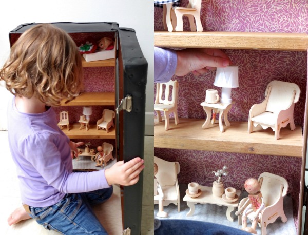 Play with a suitcase dollhouse